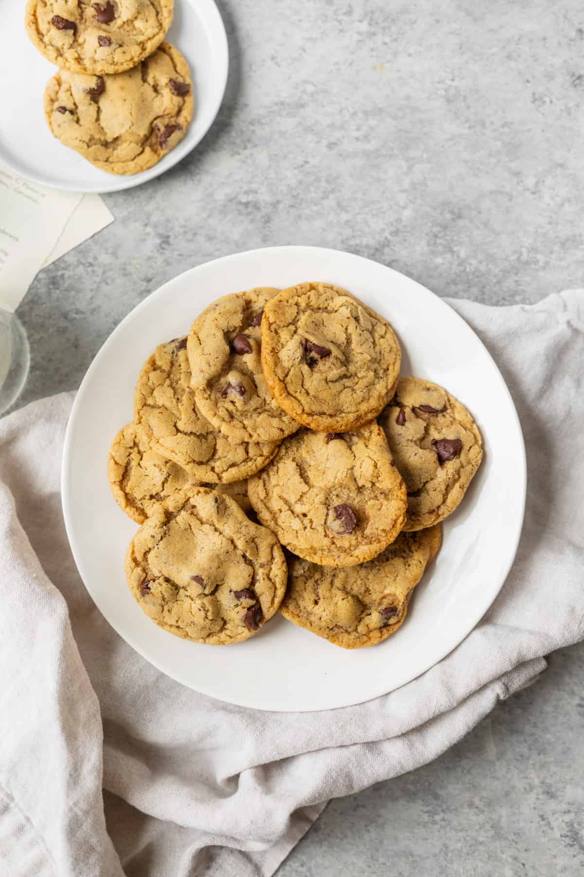 The Best Vegan Chocolate Chip Cookies 12 Chocolate Chip Cookies On A Plate