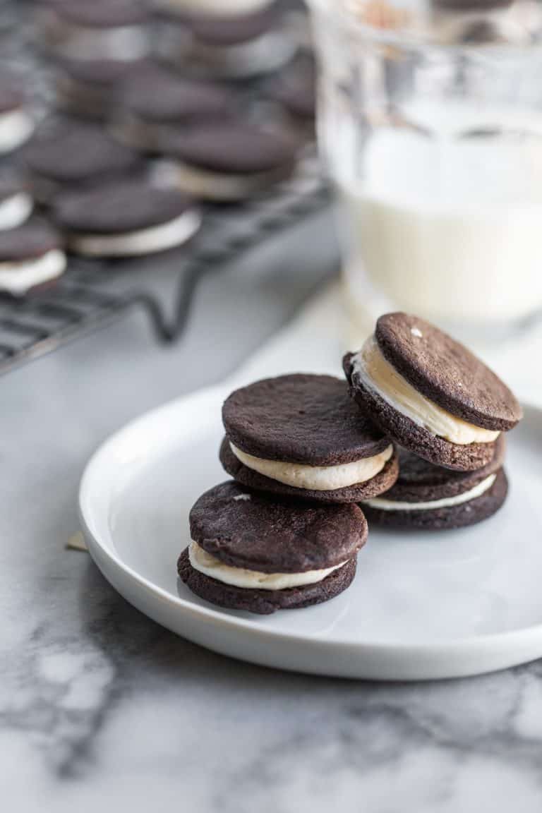 Vegan Oreo Cookies Stacked On A Plate