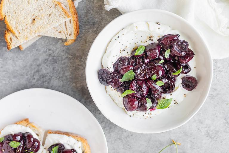 Whipped Ricotta With Cherries On A Plate
